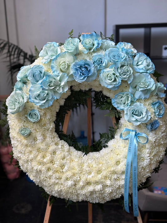 Circle spray “Roses in blue” flower arrangement Beverly Hills Los Angeles florist
