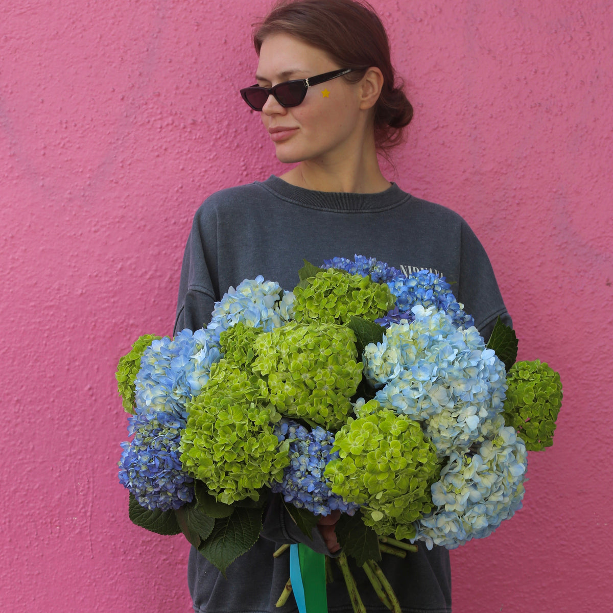 Crystal Lagoon floral arrangement from Pink Clover LA, styled with lush greenery and calming tones