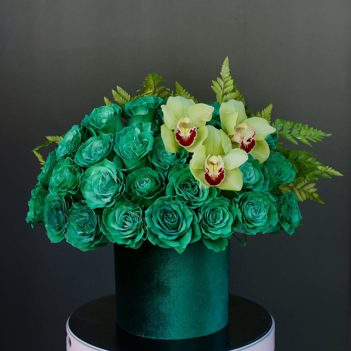 Hunter’s Harmony teal green-dyed roses green cymbidium orchids same-day delivery Los Angeles