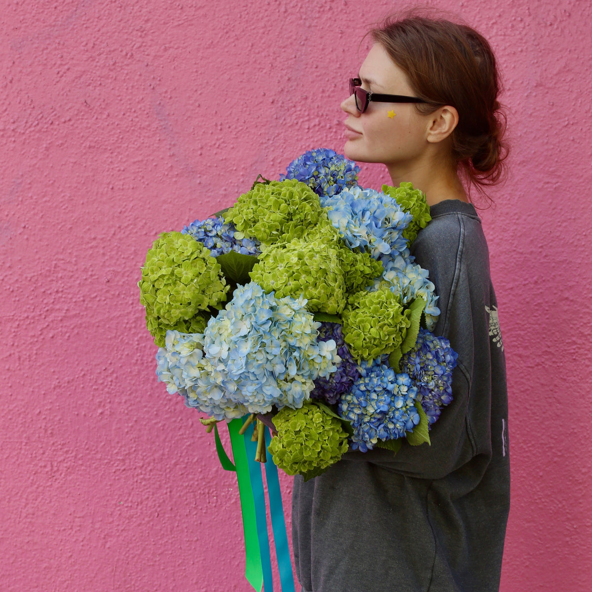 Handcrafted bouquet featuring blue and white blooms, perfect for tranquil decor