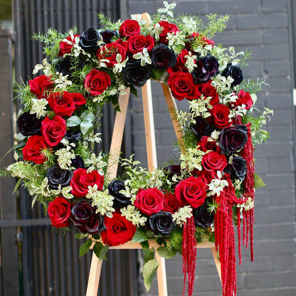 Elegant floral arrangement of white blooms, symbolizing peace and remembrance