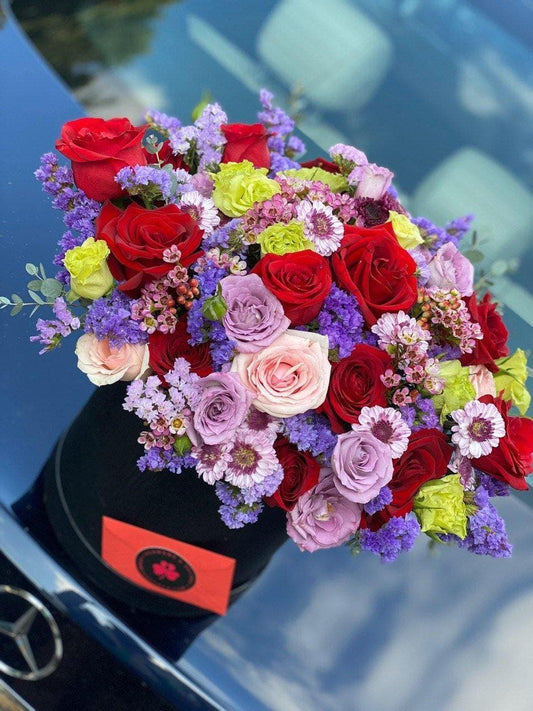 Bright arrangement with mix of roses roses same-day delivery Los Angeles