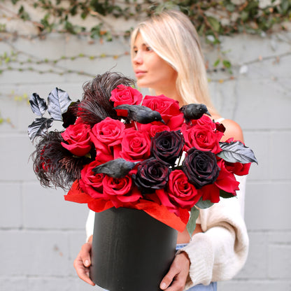 Handcrafted Raven Rose bouquet showcasing rich colors and hauntingly beautiful floral design
