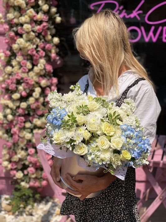 Lidia (roses, orchids and carnations) roses same-day delivery Los Angeles