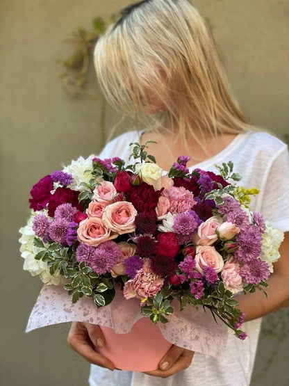 Nina(Pink Lily with carnations and roses flowers in round box) flower arrangement Beverly Hills Los Angeles florist