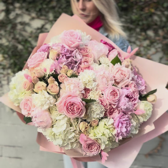 Handcrafted Milana floral gift with fresh blooms presented in a精致 glass vase for a refined and memorable presentation