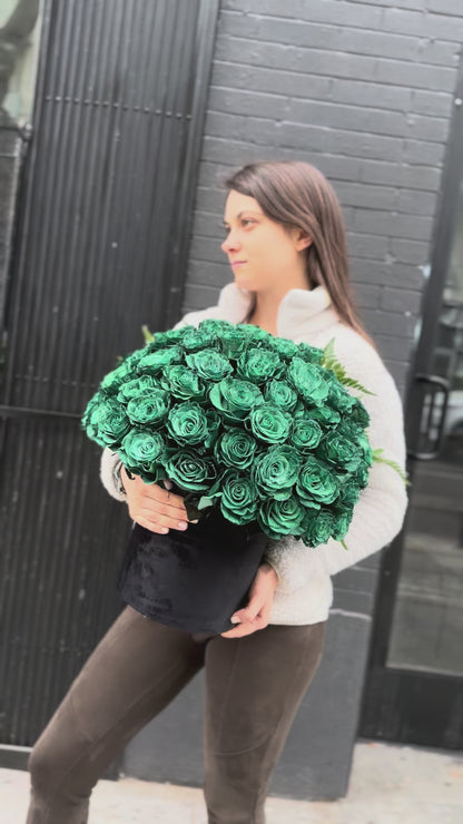Full view of the Green Roses in Black Velvet Box, styled against a dark backdrop to emphasize the rich color and premium presentation.
