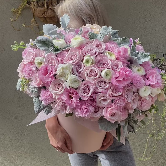 Luxurious Pink Heaven bouquet featuring roses, hydrangeas and ranunculus, beautifully styled for premium floral delivery
