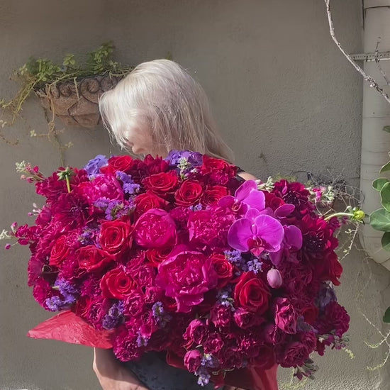 Handcrafted Burgundy Box floral gift with fresh blooms and artistic design, beautifully presented for seasonal celebrations