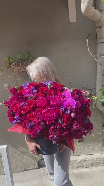 Handcrafted Burgundy Box floral gift with fresh blooms and artistic design, beautifully presented for seasonal celebrations