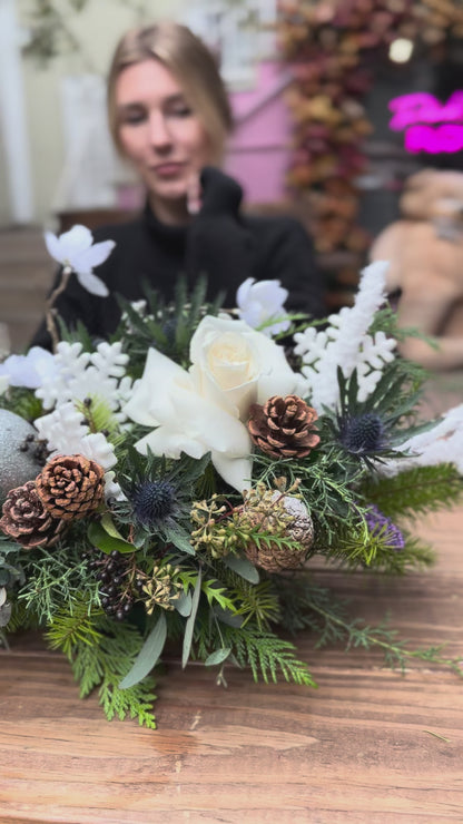 Luxurious Christmas flower design in white and green tones, ideal for seasonal gifting and holiday decor